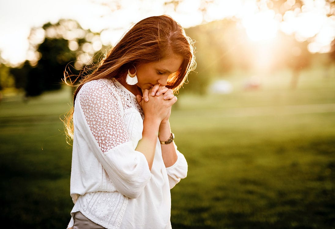 Woman Saying Prayer Woman Saying Prayer